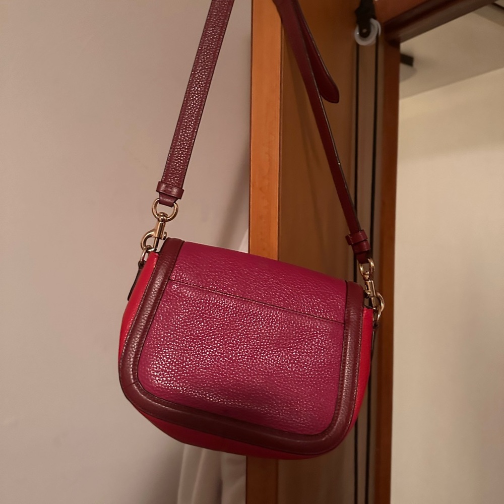 Multi color crossbody Hot pink and Red in color